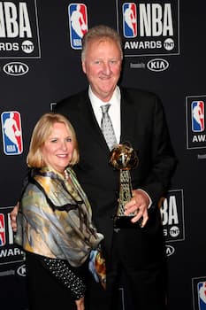 A photo of Dinah and her husband Larry Bird